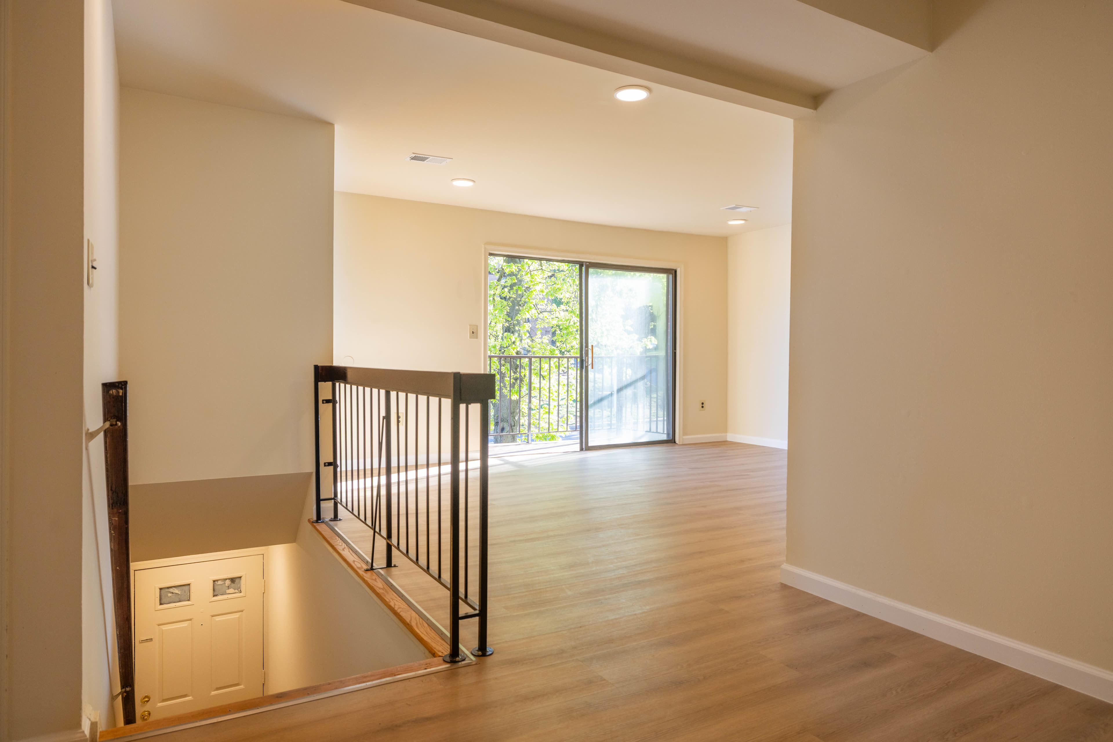 Spacious living room with hardwood floors